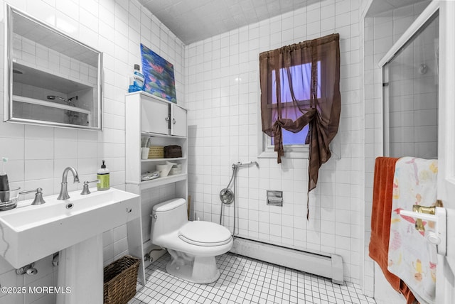 2776 John F Kennedy Blvd, Jersey City, NJ 07306 - full bathroom featuring tile walls, toilet, tile patterned floors, walk in shower, and a baseboard radiator