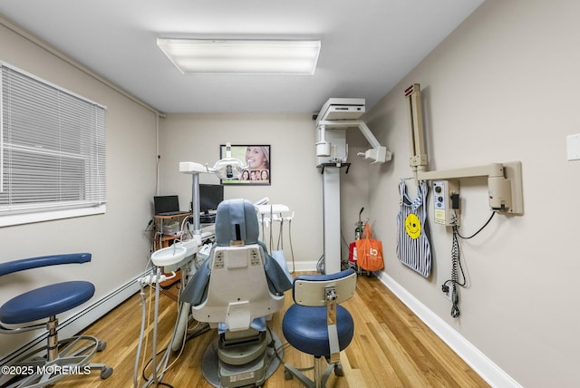 2776 John F Kennedy Blvd, Jersey City, NJ 07306 - office area featuring baseboards, wood finished floors, and baseboard heating