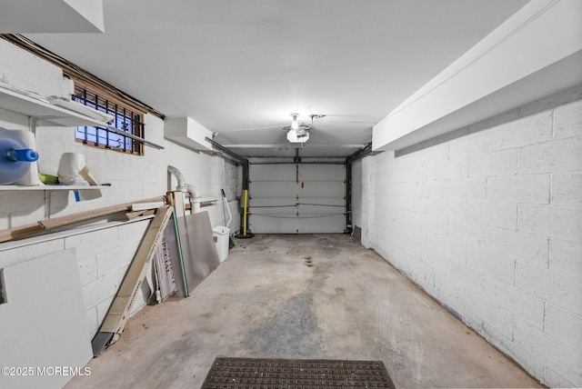 2776 John F Kennedy Blvd, Jersey City, NJ 07306 - garage featuring a garage door opener and concrete block wall