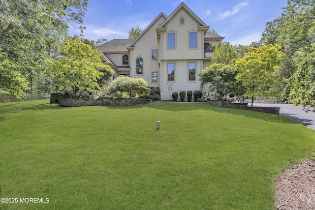 6 Canterbury Ct, Jackson, NJ 08527 - rear view of house featuring stucco siding