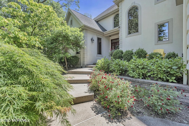 6 Canterbury Ct, Jackson, NJ 08527 - doorway to property featuring stucco siding and a shingled roof