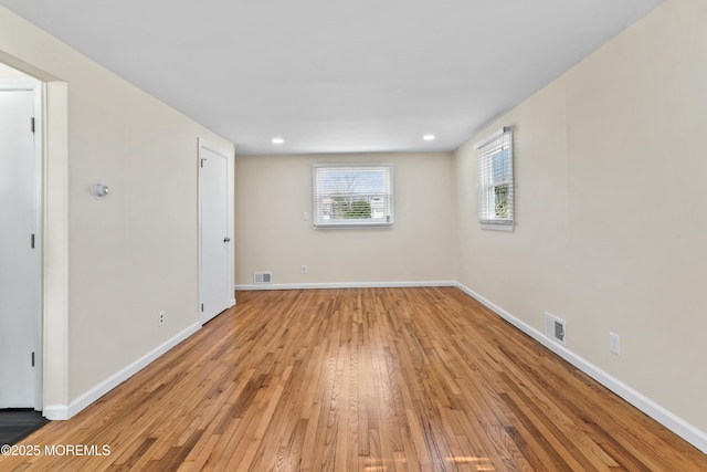 89 Barkalow Ave, Freehold, NJ 07728 - spare room featuring visible vents, baseboards, and light wood-type flooring