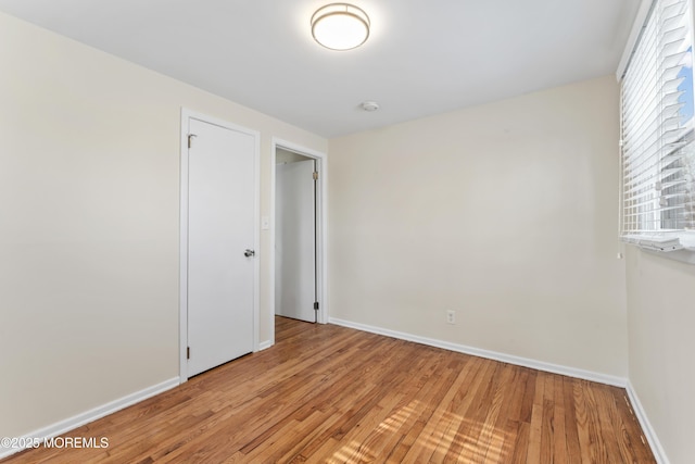 89 Barkalow Ave, Freehold, NJ 07728 - unfurnished room with light wood-type flooring and baseboards