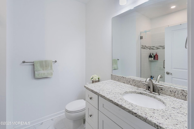 full bath featuring toilet, vanity, a shower stall, marble finish floor, and baseboards