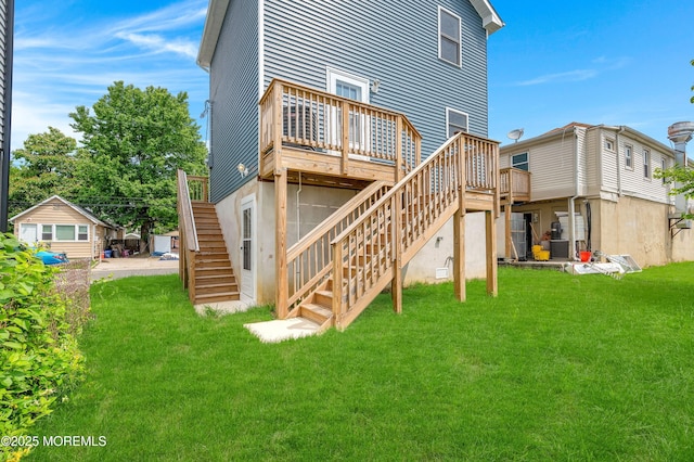 42 W Shore St, Keansburg, NJ 07734 - back of house with stairs, a yard, a deck, and central AC