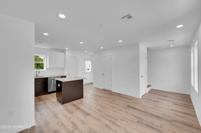 42 W Shore St, Keansburg, NJ 07734 - kitchen with light countertops, a kitchen island, a sink, recessed lighting, and stainless steel dishwasher