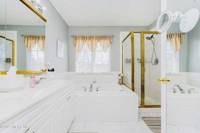 19 Summerhill Ave, Jackson, NJ 08527 - bathroom featuring a garden tub, a sink, a stall shower, and a healthy amount of sunlight