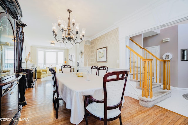 19 Summerhill Ave, Jackson, NJ 08527 - dining room with crown molding, an inviting chandelier, visible vents, stairs, and light wood finished floors