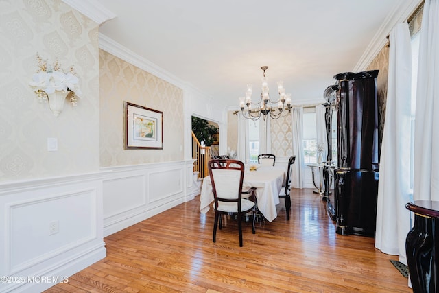 19 Summerhill Ave, Jackson, NJ 08527 - dining area with crown molding, light wood-type flooring, stairway, a chandelier, and wallpapered walls
