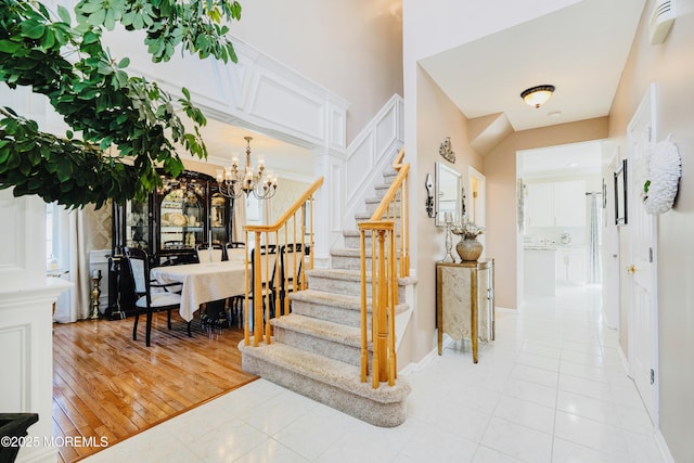 19 Summerhill Ave, Jackson, NJ 08527 - staircase with tile patterned floors and a notable chandelier