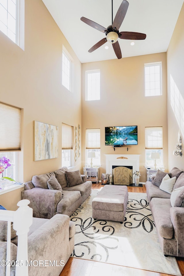 19 Summerhill Ave, Jackson, NJ 08527 - living area featuring plenty of natural light, a towering ceiling, and ceiling fan