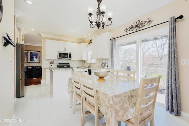 19 Summerhill Ave, Jackson, NJ 08527 - dining area featuring recessed lighting, light tile patterned floors, a notable chandelier, and ornamental molding