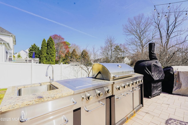 19 Summerhill Ave, Jackson, NJ 08527 - view of patio with fence, an outdoor kitchen, and a sink