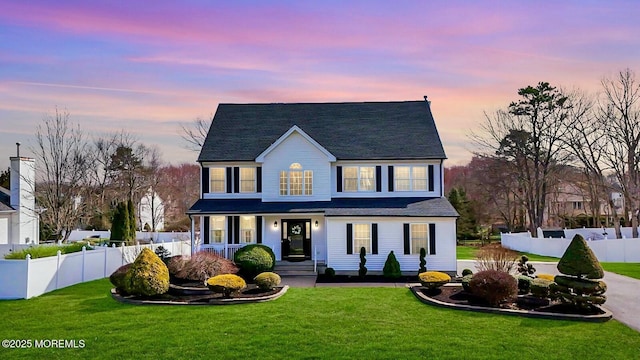 19 Summerhill Ave, Jackson, NJ 08527 - view of front of house featuring fence and a front lawn