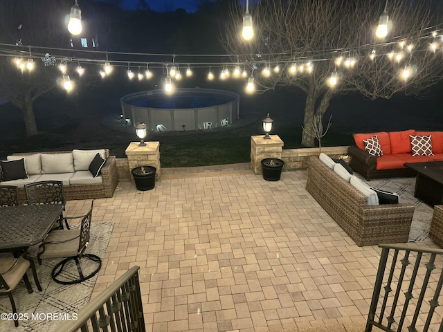 19 Summerhill Ave, Jackson, NJ 08527 - patio at twilight featuring an outdoor living space and a pool