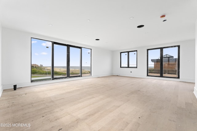 18 Seaview Ave, Long Branch, NJ 07740 - spare room with light wood finished floors and baseboards