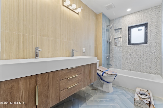 18 Seaview Ave, Long Branch, NJ 07740 - bathroom featuring toilet, shower / bath combination, double vanity, and tile walls
