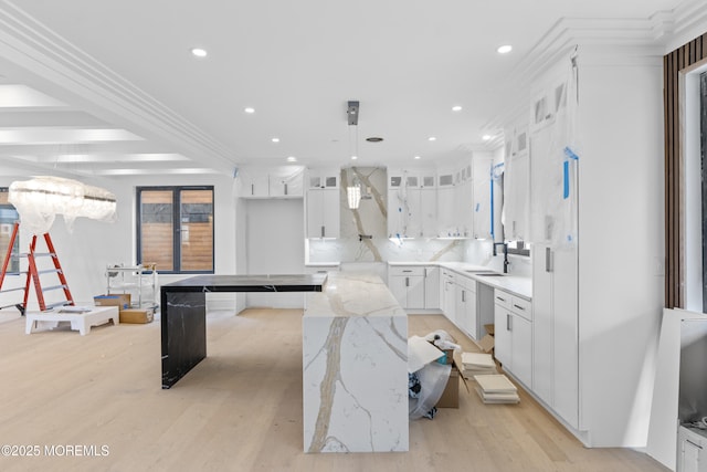 18 Seaview Ave, Long Branch, NJ 07740 - kitchen with light wood-type flooring, glass insert cabinets, a sink, a center island, and recessed lighting