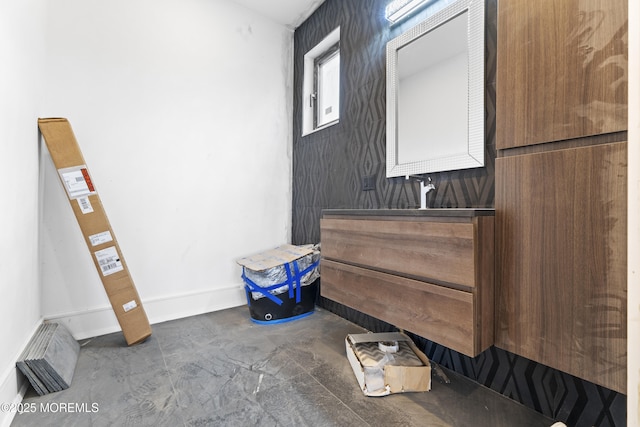 18 Seaview Ave, Long Branch, NJ 07740 - bathroom featuring concrete floors, vanity, and baseboards