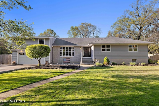 113 Parker Rd, West Long Branch, NJ 07764 - view of front of home featuring driveway, a front yard, a garage, and fence