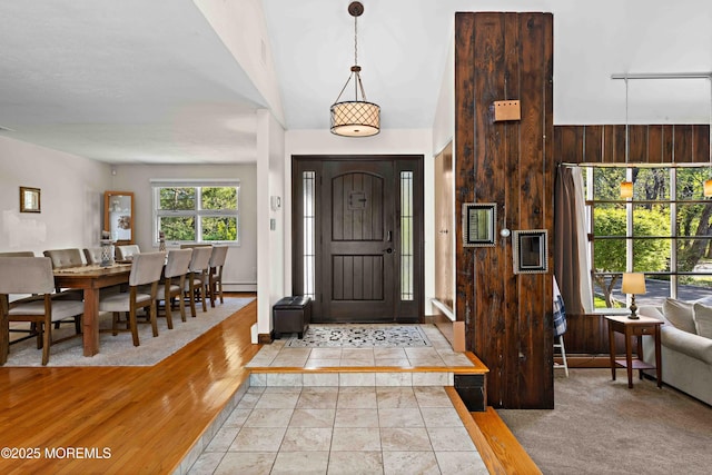 113 Parker Rd, West Long Branch, NJ 07764 - entryway with wood walls and a baseboard heating unit