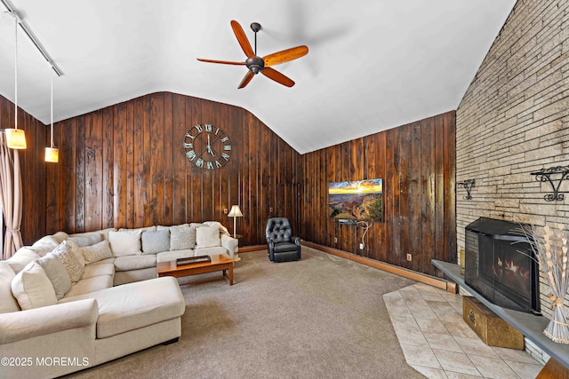 113 Parker Rd, West Long Branch, NJ 07764 - living room featuring vaulted ceiling, ceiling fan, wooden walls, and carpet flooring