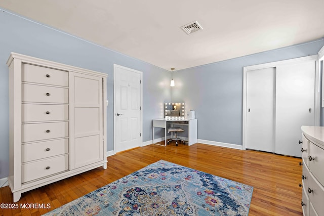 113 Parker Rd, West Long Branch, NJ 07764 - bedroom with light wood-style floors, visible vents, and baseboards