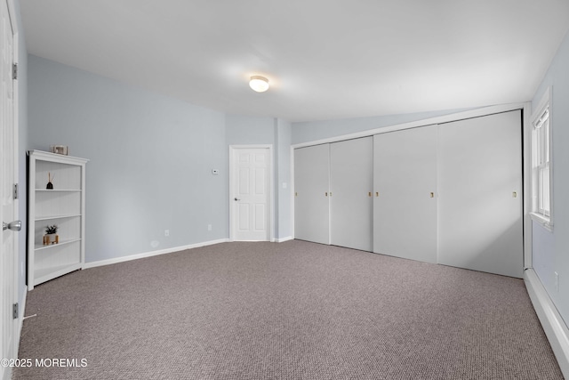 113 Parker Rd, West Long Branch, NJ 07764 - unfurnished bedroom featuring baseboards, carpet flooring, and a closet