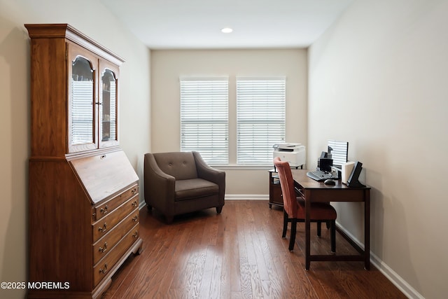 office space featuring baseboards and dark wood-style flooring