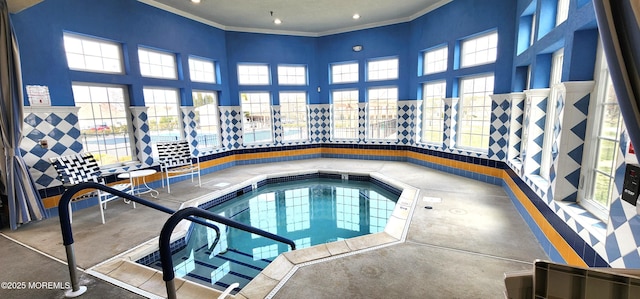 view of pool with an indoor hot tub