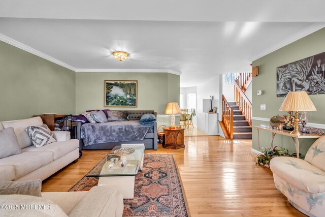 265 Marigold Ct, Toms River, NJ 08757 - living area featuring ornamental molding, baseboards, stairs, and light wood-type flooring