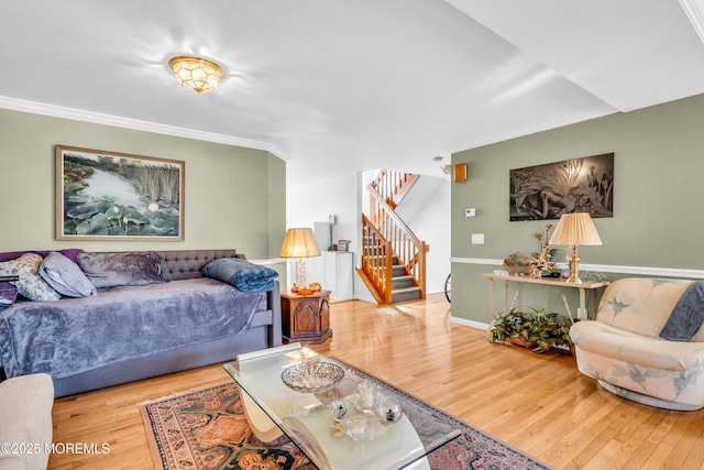265 Marigold Ct, Toms River, NJ 08757 - living area featuring ornamental molding, stairway, and wood finished floors
