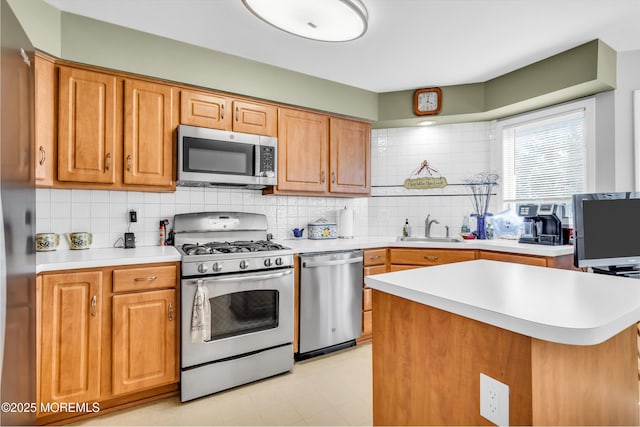 265 Marigold Ct, Toms River, NJ 08757 - kitchen featuring light countertops, a sink, and stainless steel appliances