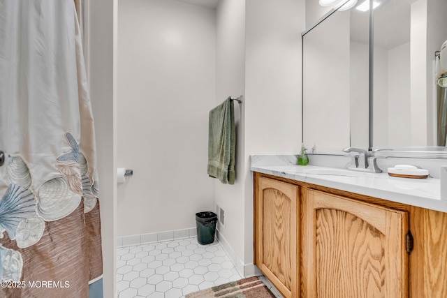 265 Marigold Ct, Toms River, NJ 08757 - bathroom with tile patterned flooring, vanity, and baseboards