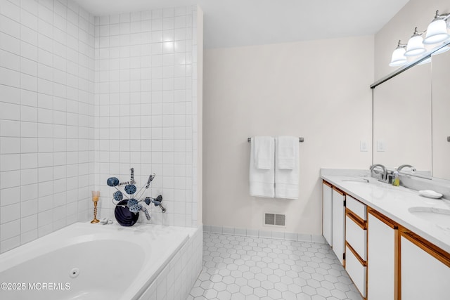 265 Marigold Ct, Toms River, NJ 08757 - bathroom with tile patterned floors, a sink, a whirlpool tub, visible vents, and double vanity