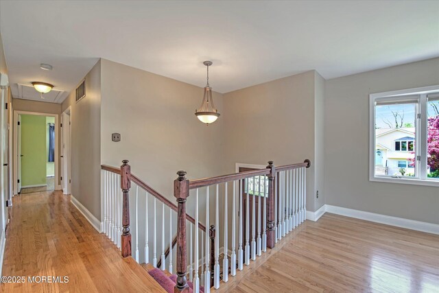 7 Mill Rd, Jamesburg, NJ 08831 - hall featuring an upstairs landing, light wood-style floors, and baseboards