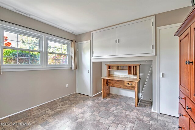 7 Mill Rd, Jamesburg, NJ 08831 - interior space with stone finish floor, visible vents, a closet, and baseboards