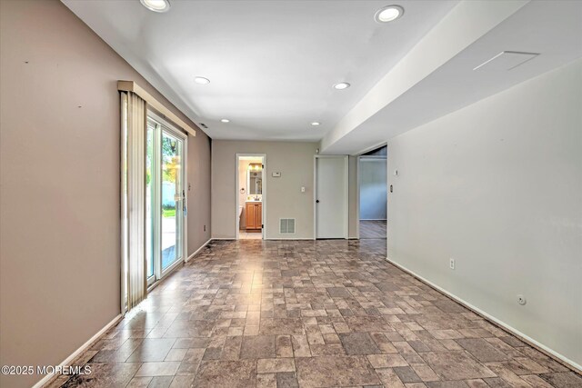 7 Mill Rd, Jamesburg, NJ 08831 - empty room featuring baseboards, visible vents, stone tile flooring, and recessed lighting
