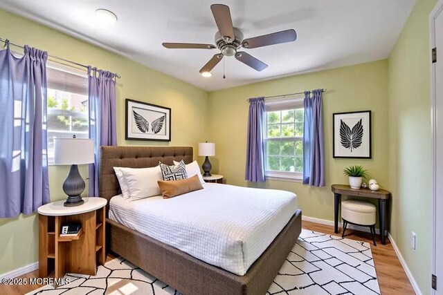 7 Mill Rd, Jamesburg, NJ 08831 - bedroom featuring light wood-style floors, a ceiling fan, and baseboards