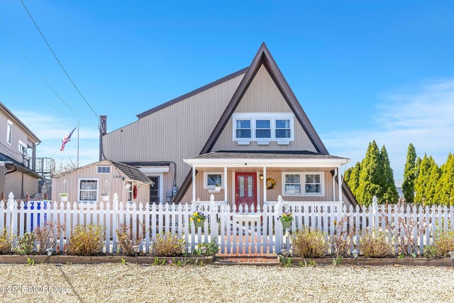 148 Royal Dr, Brick, NJ 08723 - view of front of house with a porch and a fenced front yard