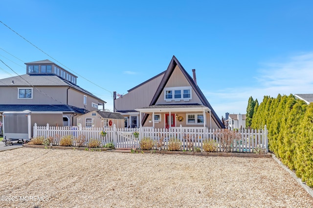 148 Royal Dr, Brick, NJ 08723 - a-frame style home featuring a fenced front yard