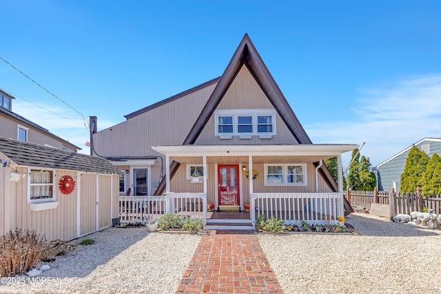 148 Royal Dr, Brick, NJ 08723 - view of front of home with fence and a porch