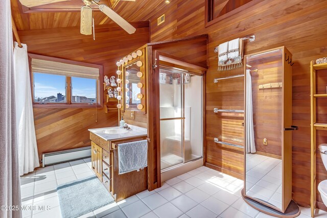 148 Royal Dr, Brick, NJ 08723 - full bath featuring a baseboard radiator, tile patterned flooring, wood walls, and a ceiling fan