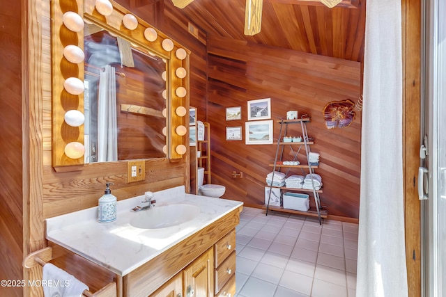 148 Royal Dr, Brick, NJ 08723 - bathroom with vanity, baseboards, tile patterned floors, wood ceiling, and wooden walls
