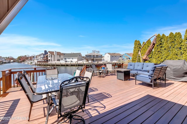 148 Royal Dr, Brick, NJ 08723 - deck with an outdoor living space, area for grilling, a residential view, outdoor dining space, and a water view