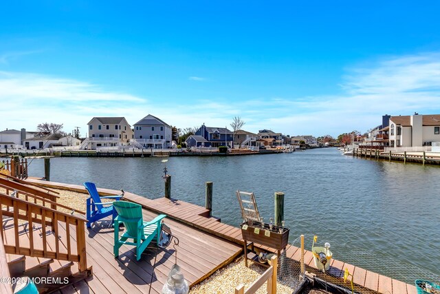 148 Royal Dr, Brick, NJ 08723 - dock area with a residential view and a water view