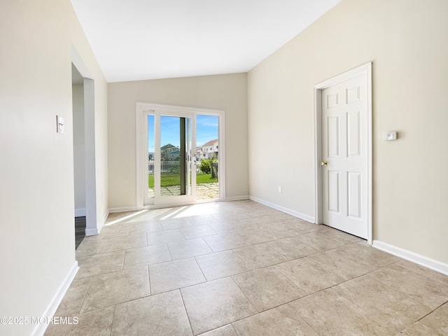 3 W Potomac Dr, Little Egg Harbor, NJ 08087 - unfurnished room featuring lofted ceiling and light tile patterned floors