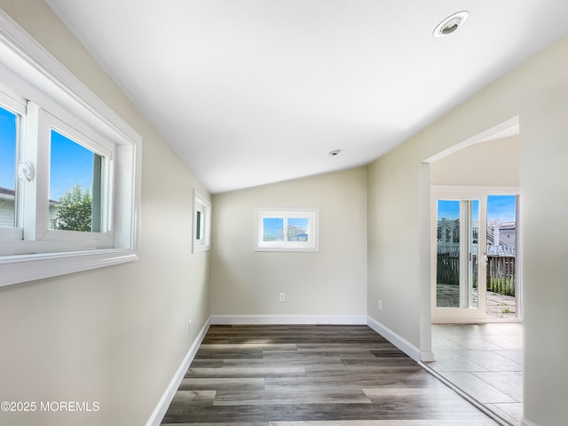 3 W Potomac Dr, Little Egg Harbor, NJ 08087 - unfurnished room featuring plenty of natural light, lofted ceiling, and wood finished floors