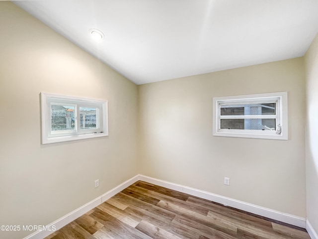 3 W Potomac Dr, Little Egg Harbor, NJ 08087 - unfurnished room with wood finished floors and vaulted ceiling