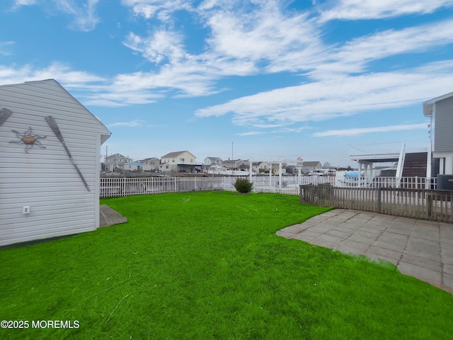 3 W Potomac Dr, Little Egg Harbor, NJ 08087 - fenced backyard featuring a patio and a residential view